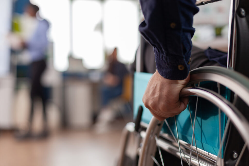 close up independence handicapped man in wheelchair