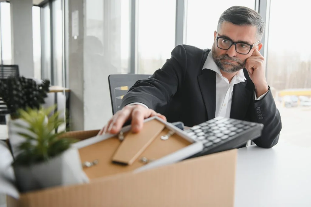 old male employee being fired from his work