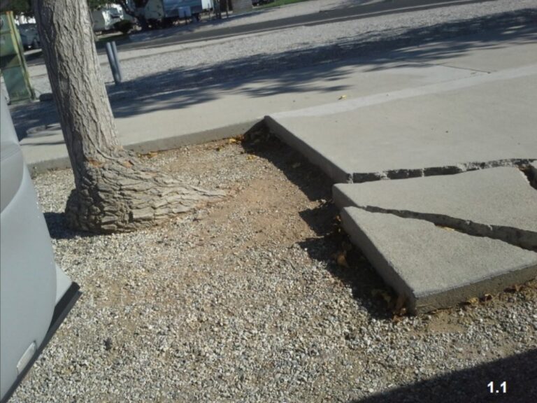 California premises liability injury case exhibit of a cracked concrete pad trip hazard at an RV park