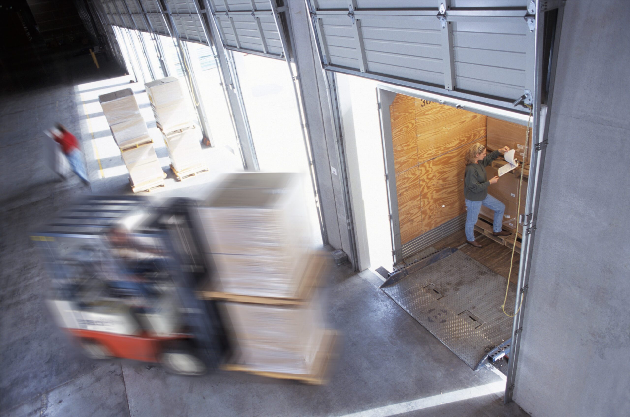 Delivery truck backed into a retail loading dock illustrating a retail loading dock injury case